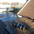 Een garagedak isoleren en opnieuw branden te Houten (oude staat)